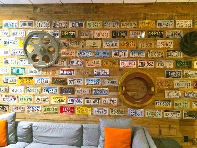 The license plate wall at the Altoona Data Center was created with plates and pieces from West End Architectural Salvage & Coffee Shop in Des Moines