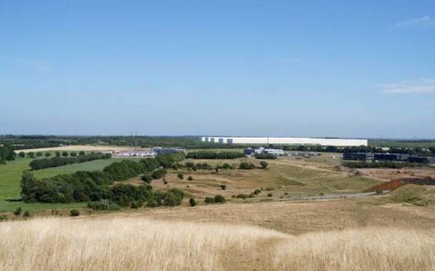 A visualization from Cowi shows the proposed data center in Esbjerg. The campus will have four data centers and administration buildings. In total, the center will have fully built 250,000 square m...