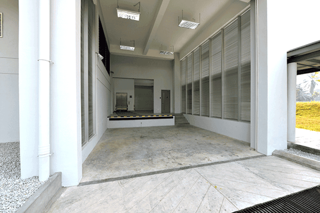 The loading bay consists of a one meter height platform for two trucks for loading/unloading of heavy equipment. The roller shutter is integrated with interlocking control design to prevent unautho...