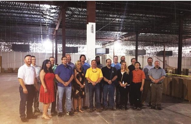 OKC data center celebration as employees & workers held a topping out ceremony. Each signed a pillar.
